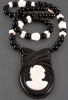 black bakelite cameo necklace